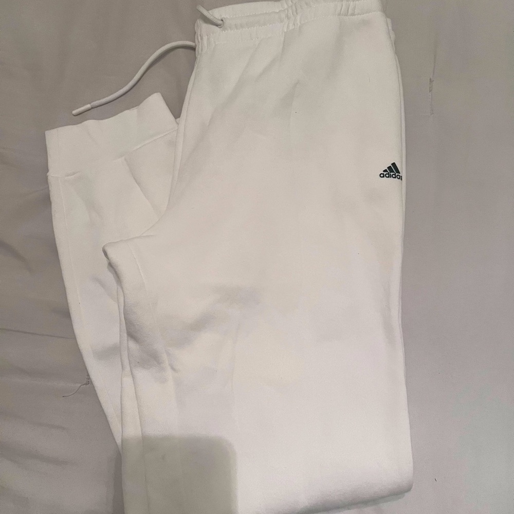 Women’s Adidas golf/joggers. Size large. Color white. Brand new.